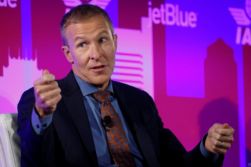 United Airlines CEO pitched American Airlines tie-up in meeting with Trump, sources say